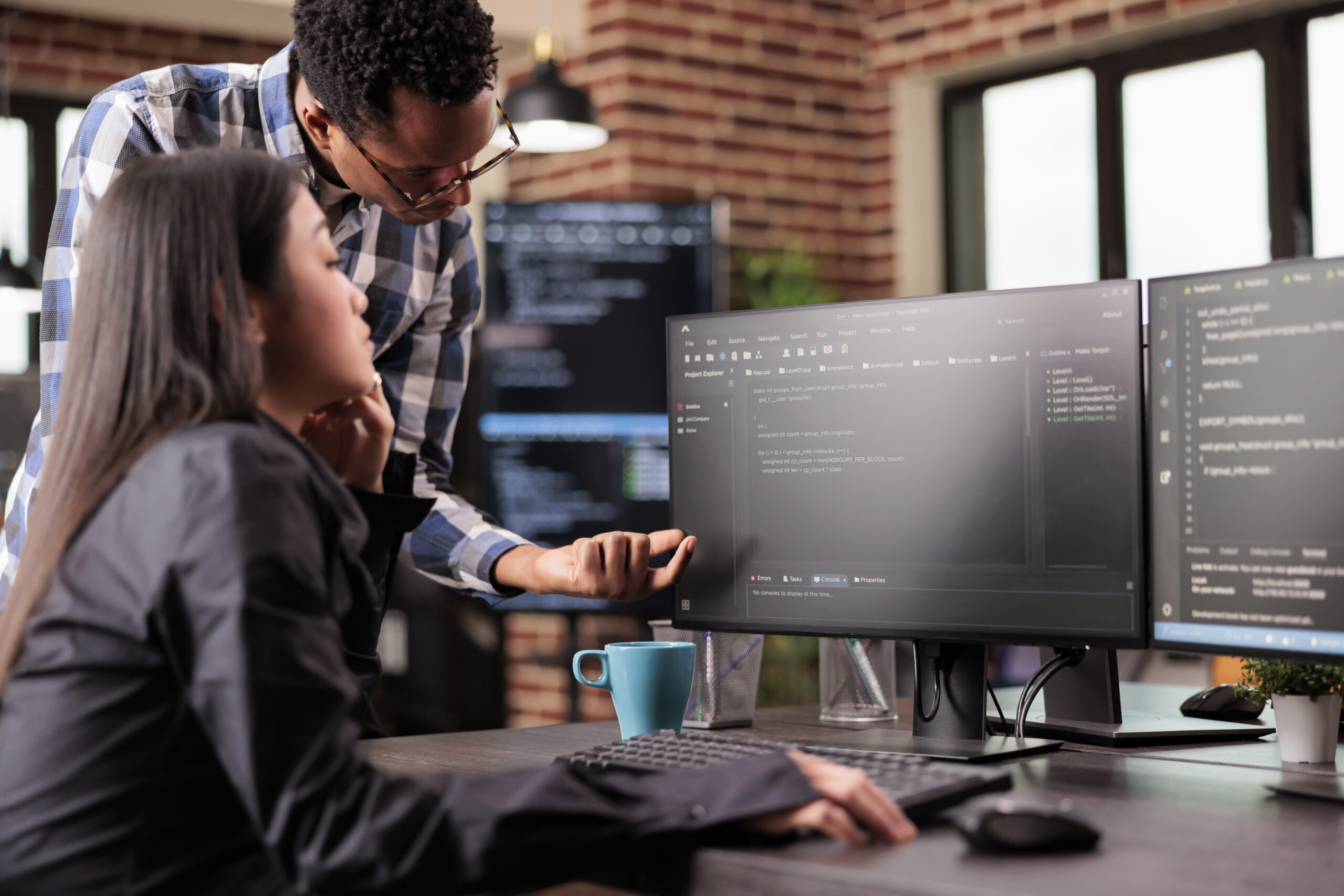Diverse Programmers Discussing About Html Code Compiling Discovers Errors Standing Front Multiple Screens Startup Office Software Developers Working Server Interface Development Scaled